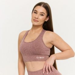 Biustonosz damski fitness bezszwowy FLO Mauve. Fioletowe biustonosze sportowe damskie GYMBEAM, bez wzorów, z elastanu. Za 89.90 zł.