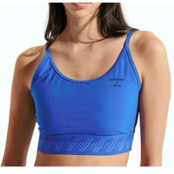 Biustonosz damski sportowy Superdry Essential Strappy. Niebieskie biustonosze sportowe damskie Superdry., bez wzorów, z bawełny. Za 102.00 zł.