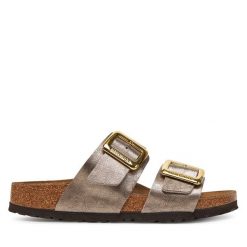 Klapki Birkenstock. Żółte klapki damskie Birkenstock, bez wzorów, bez obcasa. Za 429.99 zł.