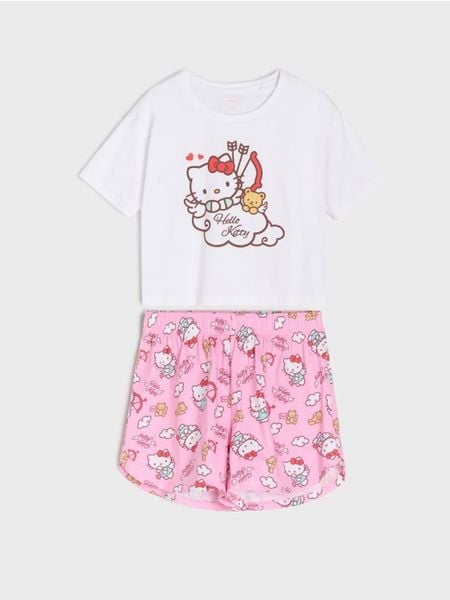 Bawełniana piżama dwuczęściowa z nadrukiem Hello Kitty - biały. Białe piżamy damskie Sinsay, l, bez wzorów, z bawełny, bez ramiączek. Za 49.99 zł.