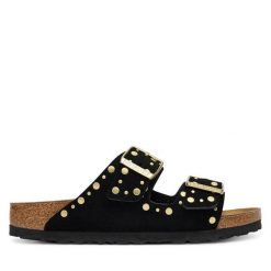 Klapki Birkenstock. Czarne klapki damskie Birkenstock, bez wzorów, bez obcasa. Za 639.99 zł.