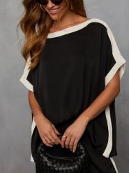 Milan Kiss Bluzka w kolorze czarnym rozmiar: M. Czarne bluzki damskie Milan Kiss, m, bez wzorów, bez kołnierzyka, bez ramiączek. Za 131.12 zł.