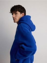 Bluza z kapturem - niebieski. Niebieskie bluzy z kapturem męskie Reserved, l, z bawełny. W wyprzedaży za 79.99 zł.