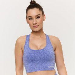 Biustonosz sportowy damski bezszwowy kobaltowy FLO. Niebieskie biustonosze sportowe damskie GYMBEAM, bez wzorów, z elastanu. Za 89.90 zł.
