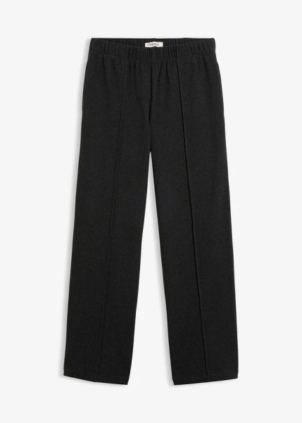 Spodnie z gumką w talii z miękkiego prążkowanego dżerseju. Czarne spodnie materiałowe damskie bonprix, bez wzorów, z dżerseju, eleganckie. Za 129.99 zł.