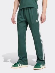Adidas Spodnie dresowe w kolorze zielono-białym rozmiar: XL. Białe spodnie dresowe męskie Adidas, bez wzorów, z dresówki. Za 158.10 zł.