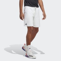 Ergo Tennis Shorts. Białe szorty męskie Adidas, bez wzorów, z elastanu, klasyczne. Za 241.95 zł.