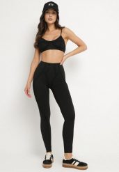 Czarny Komplet Sportowy z Ozdobnymi Przeszyciami Legginsy i Top na Ramiączkach Filinella. Czarne legginsy damskie Born2be, m, bez wzorów, bez ramiączek. Za 84.99 zł.