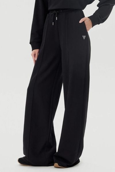 GUESS Czarne dresowe spodnie damskie Primula, Rozmiar XS. Czarne spodnie dresowe damskie Guess, s, z aplikacjami, z dresówki. W wyprzedaży za 234.99 zł.