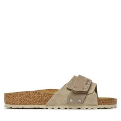 Klapki Birkenstock. Brązowe klapki damskie Birkenstock, bez wzorów, bez obcasa. Za 439.99 zł.