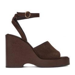 Sandały GINO ROSSI. Brązowe sandały damskie Gino Rossi, bez wzorów, bez obcasa, na koturnie. Za 249.99 zł.