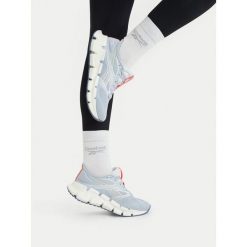 Buty do biegania Reebok. Niebieskie obuwie do biegania damskie Reebok. Za 489.99 zł.