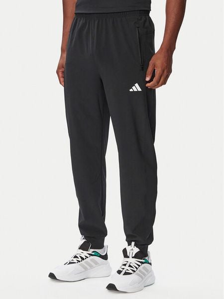Adidas Spodnie dresowe Workout Essentials KA5528 Czarny Regular Fit. Czarne spodnie dresowe męskie Adidas, z dresówki. Za 239.99 zł.