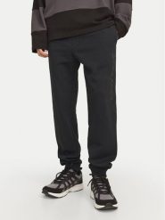 Jack & Jones Spodnie dresowe Gordon 12258477 Czarny Regular Fit. Czarne spodnie dresowe męskie Jack & Jones, bez wzorów, z bawełny. Za 69.99 zł.