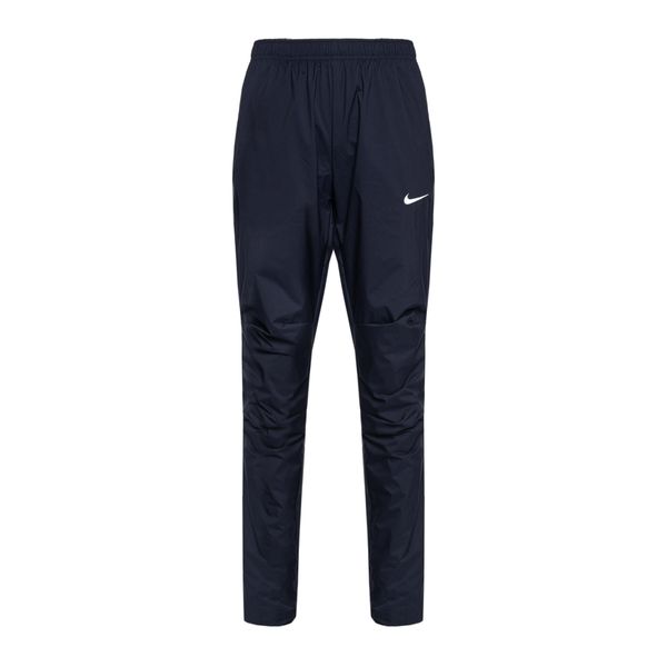 Spodnie do biegania damskie Nike Woven. Niebieskie spodnie materiałowe damskie Nike, bez wzorów, sportowe. Za 99.99 zł.