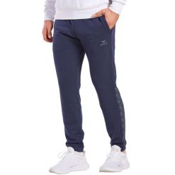 Spodnie do biegania Erima Essential Team. Niebieskie szorty męskie Erima, bez wzorów, sportowe. Za 187.00 zł.