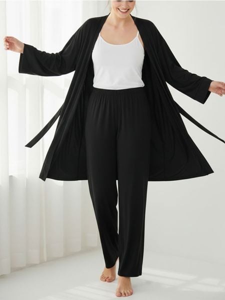 Spodnie piżamowe z szeroką nogawką - czarny. Czarne piżamy damskie Sinsay, bez wzorów. Za 29.99 zł.