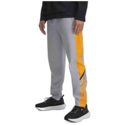 Spodnie do biegania męskie Under Armour Velociti Storm. Szare spodnie sportowe męskie Under Armour, z dresówki. Za 189.99 zł.