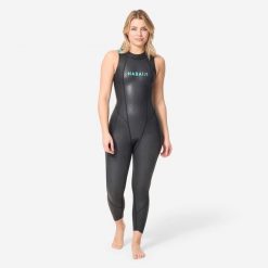 Kombinezon pływacki openwater LongJane damski Nabaiji OWS 500 z neoprenu 2/2 mm. Czarne kombinezony damskie NABAIJI, s, bez wzorów, z elastanu, sportowe, bez kołnierzyka, bez ramiączek. Za 549.99 zł.