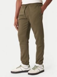 Tommy Jeans Spodnie dresowe DM0DM20473 Khaki Regular Fit. Brązowe spodnie dresowe męskie Tommy Jeans, bez wzorów, z bawełny. Za 249.99 zł.