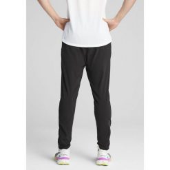 Męskie spodnie RUN VELOCITY o zwężanym kroju PUMA Black. Czarne spodnie dresowe męskie Puma, bez wzorów, sportowe. Za 179.99 zł.