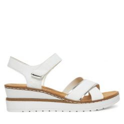 Sandały Rieker. Białe sandały damskie Rieker, bez wzorów, bez obcasa, na koturnie. Za 289.99 zł.
