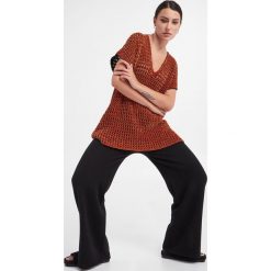 Tunika WOLFORD. Tuniki damskie Wolford, l, bez wzorów, bez kołnierzyka, bez ramiączek. W wyprzedaży za 1,164.87 zł.