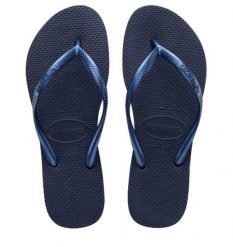 Klapki Havaianas Model 4000030 Kolor Niebieski. Niebieskie klapki damskie Havaianas, bez wzorów, z gumy, bez obcasa. Za 94.99 zł.