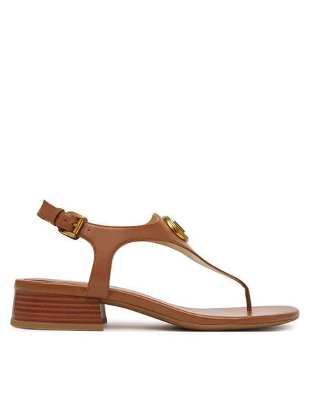 MICHAEL Michael Kors Sandały Mckenzie 40T6MZFS1L Brązowy. Brązowe sandały damskie MICHAEL Michael Kors, bez wzorów, ze skóry, bez obcasa, na płaskiej podeszwie. Za 719.99 zł.