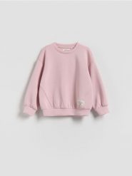 Gładka bluza z modalem - pastelowy róż. Czerwone bluzy i bluzki niemowlęce Reserved, bez wzorów, z dzianiny, bez ramiączek, bez kaptura. Za 49.99 zł.