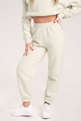 Spodnie fitness damskie Gym Glamour dresowe off. Białe spodnie sportowe damskie GYM GLAMOUR, l, z bawełny, na fitness i siłownię. Za 189.99 zł.