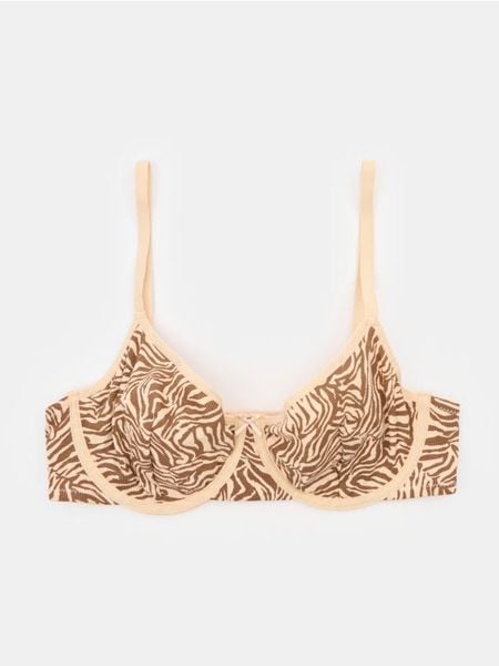 Bawełniany biustonosz miękki z fiszbinami w panterkę - wielobarwny. Biustonosze Sinsay, bez wzorów, z bawełny. Za 17.99 zł.