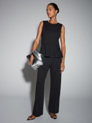 Someday Top "Kahedda" w kolorze czarnym rozmiar: 38. Czarne topy damskie Someday, bez wzorów, bez kołnierzyka. Za 104.99 zł.