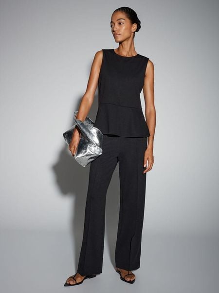 Someday Top "Kahedda" w kolorze czarnym rozmiar: 42. Czarne topy damskie Someday, bez wzorów, bez kołnierzyka. Za 131.43 zł.