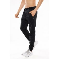 Spodnie sportowe męskie Rough Radical Energy Long. Czarne spodnie sportowe męskie ROUGH RADICAL, z dresówki. Za 159.90 zł.