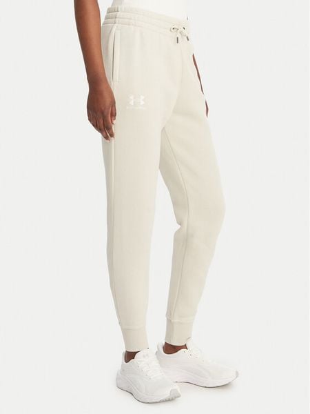 Under Armour Spodnie dresowe UA Icon Fleece 6001537 Beżowy Slim Fit. Brązowe spodnie dresowe damskie Under Armour, s, bez wzorów, z bawełny. Za 249.99 zł.