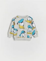Bluza oversize Kaczor Donald - jasnoszary. Szare bluzy i bluzki niemowlęce Reserved, bez wzorów, z bawełny, bez ramiączek, bez kaptura. W wyprzedaży za 35.99 zł.