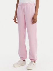 Lacoste Spodnie dresowe XF5244 Różowy Regular Fit. Czerwone spodnie dresowe damskie Lacoste, bez wzorów, z dresówki. Za 609.99 zł.