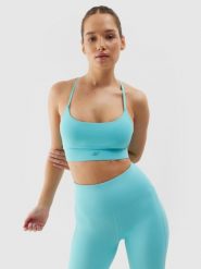 4F Biustonosz treningowy z niskim wsparciem damski - niebieski M. Niebieskie biustonosze sportowe damskie 4f, bez wzorów, z dzianiny. W wyprzedaży za 69.99 zł.