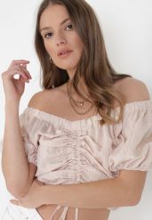 Jasnobeżowa Bluzka Aethenis. Brązowe bluzki damskie Born2be, s, bez wzorów, z jeansu, bez kołnierzyka, bez ramiączek. Za 19.99 zł.