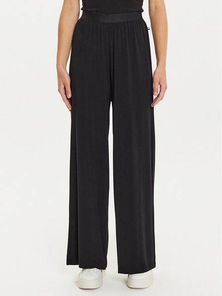 Boss Spodnie dresowe Bea 50525712 Czarny Relaxed Fit. Czarne spodnie dresowe damskie Boss, s, bez wzorów, z dresówki. Za 239.99 zł.