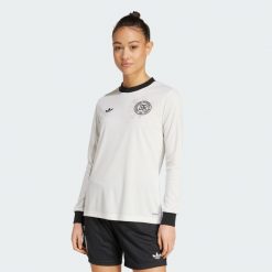 Koszulka Germany Anniversary Long Sleeve. Białe bluzki damskie Adidas, l, bez wzorów, z materiału, sportowe, bez kołnierzyka, bez ramiączek. Za 499.00 zł.