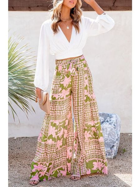 Milan Kiss Spodnie w kolorze oliwkowo-jasnoróżowym rozmiar: XL. Brązowe spodnie materiałowe damskie Milan Kiss, bez wzorów, z materiału. Za 79.21 zł.