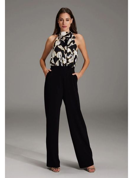 SWING Kombinezon w kolorze czarnym rozmiar: 36. Czarne kombinezony damskie Swing, bez wzorów, bez kołnierzyka, bez ramiączek. Za 283.48 zł.