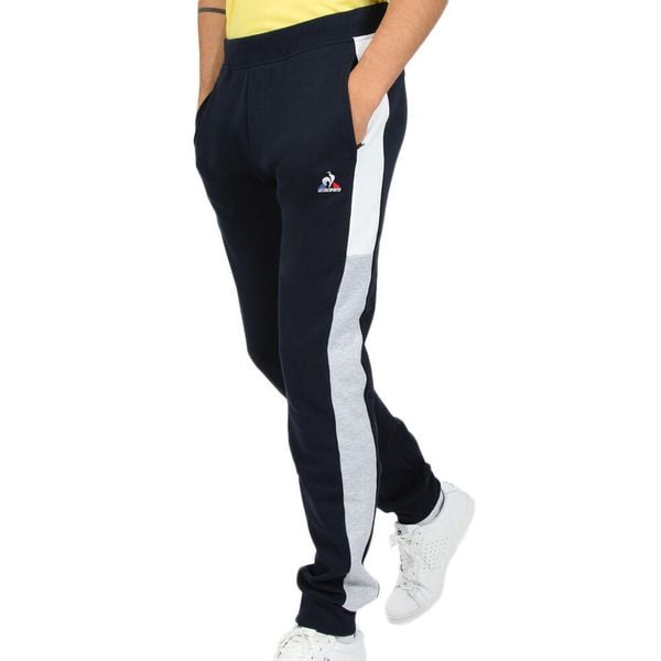 Spodnie Le Coq Sportif Saison 2 Slim Niebieskie Dorosłych. Niebieskie spodnie sportowe męskie Le Coq Sportif, z bawełny. Za 377.80 zł.