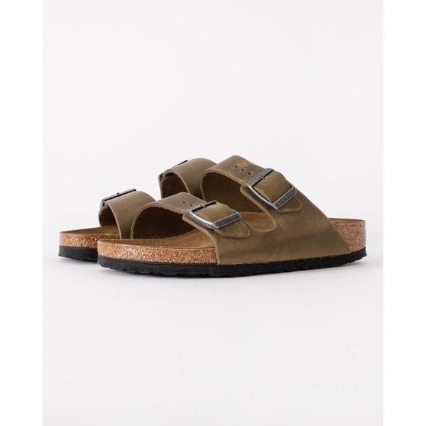 Klapki dorosłych Birkenstock Arizona Faded. Brązowe klapki damskie Birkenstock, bez wzorów, z materiału, bez obcasa. Za 569.45 zł.