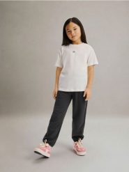 Bawełniany t-shirt - złamana biel. Koszulki dziewczęce Reserved, bez wzorów, z bawełny, bez ramiączek. Za 19.99 zł.