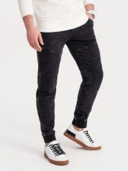 Spodnie męskie marmurkowe JOGGERY z przeszyciami - czarne V4. Czarne spodnie materiałowe męskie Ombre Clothing, bez wzorów, z bawełny. W wyprzedaży za 69.99 zł.