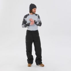 Spodnie narciarskie męskie Wedze FR100. Czarne spodnie materiałowe męskie WED'ZE, bez wzorów, z materiału, sportowe. Za 399.99 zł.
