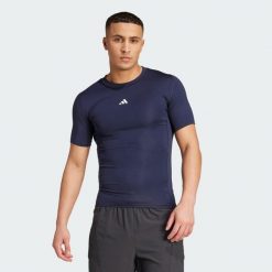 Koszulka TECHFIT Compression Training. Niebieskie t-shirty sportowe męskie Adidas, z materiału, bez ramiączek, na fitness i siłownię, techfit (adidas). Za 149.00 zł.